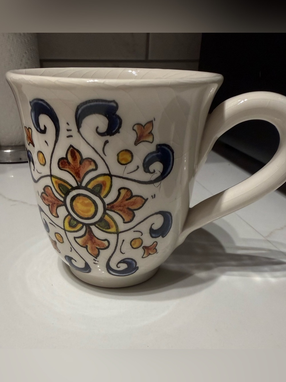 Cream Ceramic Mug with Blue and Yellow Floral Motif